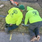 men helping to beautify detroit